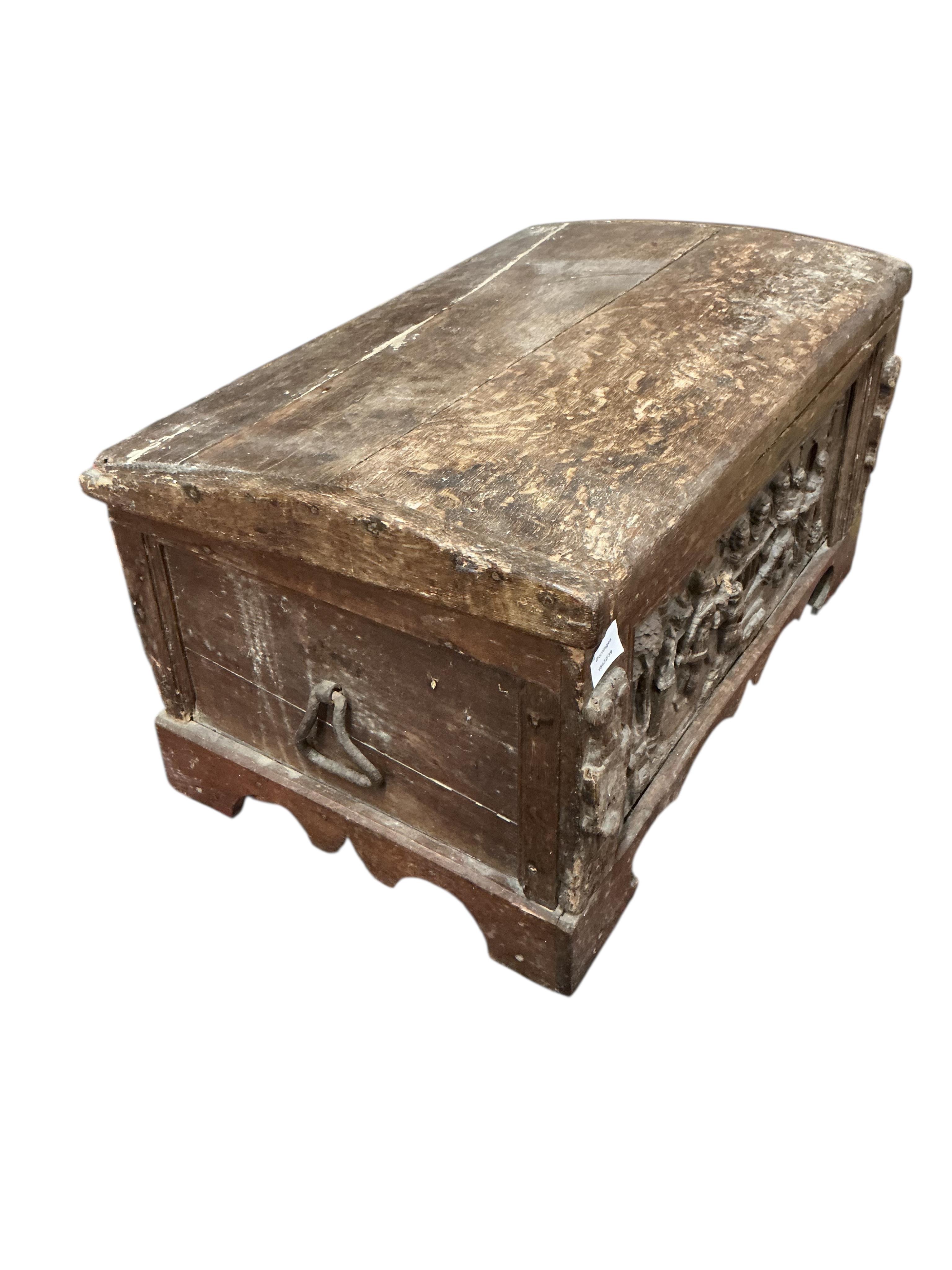 A small 17th century style carved oak domed top trunk, width 79cm, depth 50cm, height 41cm
